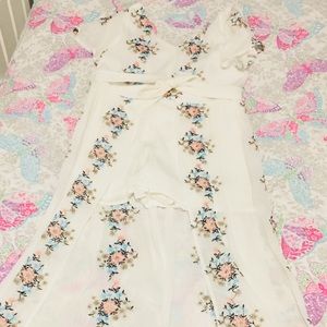 Macy’s romper with the long skirt behind it